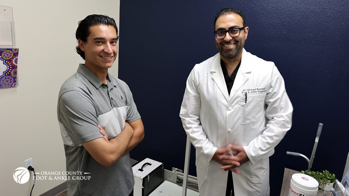 Dr. Michael Bastani interacting with patient